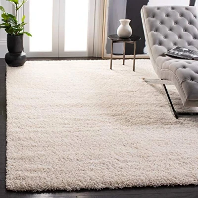 Abbildung von SAFAVIEH Zottelig Teppich für Wohnzimmer, Esszimmer, Schlafzimmer California Shag Collection, Hoher Flor, Elfenbein, 91 X 152 cm