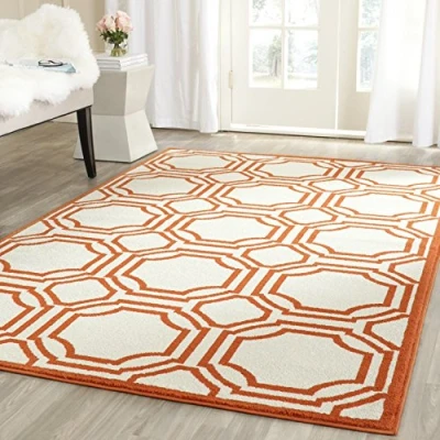 Abbildung von SAFAVIEH Geometrisch Teppich für Wohnzimmer, Esszimmer, Schlafzimmer Amherst Collection, Kurzer Flor, Elfenbein und Orange, 122 X 183 cm