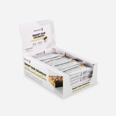 Abbildung von Body &amp; Fit Smart Riegel Crunchy Protein Low Carb Schokoladen Erdnusskaramell 12 x 45g