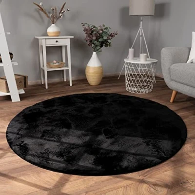 Abbildung von Paco Home Teppich Wohnzimmer Kunstfell weich waschbar modern elegant pflegeleicht Felloptik Uni Seidenglanz flauschig Kurzflor, Grösse:200 cm Rund, Farbe:Schwarz