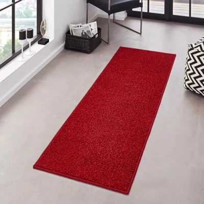 Abbildung von Hanse Home Pure Teppich Wohnzimmerteppich dichter Kurzflor Robust Schlafzimmerteppich einfarbig Modern für Esszimmer, Wohnzimmer, Kinderzimmer, Flur, Schlafzimmer, Küche Rot, 80x400cm