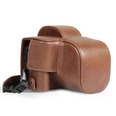 Abbildung von MegaGear Echtleder Kameratasche für Canon EOS R100 (18 45mm) stilvolle und schützende Tasche Digitale Fotografie (Braun)