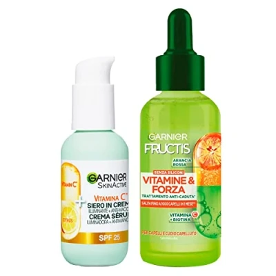 Abbildung von Garnier Fructis Vitamine und Stärke Behandlung gegen Haarausfall sprödes Haar mit Biotin Vitamin C 125 ml + Skinactive Gesichtsserum in aufhellender Anti Flecken Creme LSF25 50