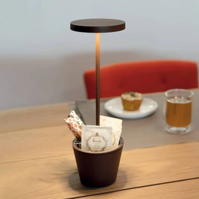 Abbildung von Zafferano, Poldina Reverso Lampe, Wiederaufladbare und Kabellose Tischlampe mit Touch Control, Geeignet für den Innen Außenbereich, Dimmer, 2200 3000 K, Höhe 35 cm, Farbe Corten