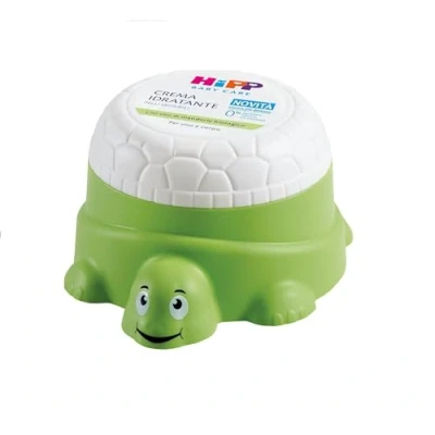 Abbildung von HiPP Baby Care Feuchtigkeitscreme für Gesicht und Körper Neugeborene, in Form einer niedlichen Schildkröte, empfindliche Haut, mit Bio Mandelöl, 1 Stück à 100 ml