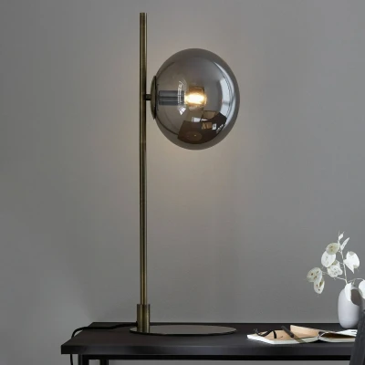 Abbildung von Tischleuchte Dione, messing/rauchgrau, Glas, Eisen
