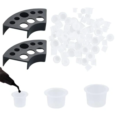 Abbildung von 300pcs Tattoo Tintenbecher mit 2 Cups Halterungen Kunststoff Farbbehälter, Kleine Small Tinte Pigment Cups+ Halter für Permanent Makeup Container Cap Zubehör