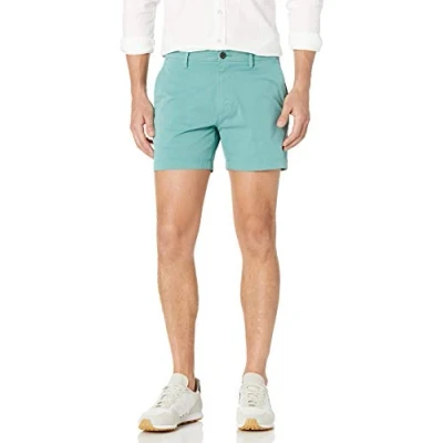 Abbildung von Amazon Essentials Herren 13 cm Flatfront Chinoshorts mit hohem Comfort in schmaler Passform (zuvor Goodthreads), Aquagrün, 36W