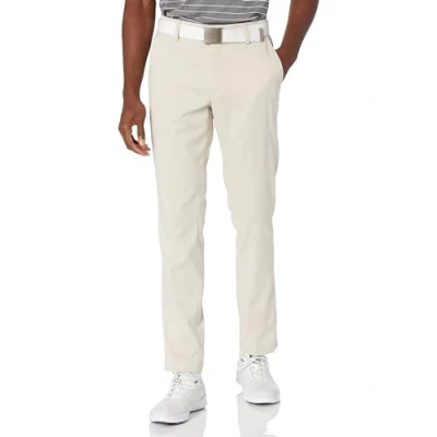 Abbildung von Amazon Essentials Herren Golf Stretchhose, Schmale Passform, Hellbeige, 30W / 32L