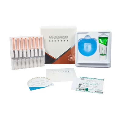 Abbildung von Opalescence PF 10% Melone Patient Kit 8 Spritzen à 1,2ml, 1 Zahncreme 30ml, Aufbewahrungsbox, Farbschlüssel