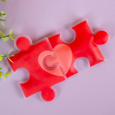 Abbildung von Fisura Originaler Handwärmer Puzzle“. Mini Gel Handwärmer, wiederverwendbar und praktisch für unterwegs. Ideal Outdoor Aktivitäten oder als Geschenk. Set mit 2 Einheiten.