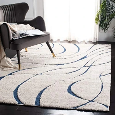 Abbildung von SAFAVIEH Zottelig Teppich für Wohnzimmer, Esszimmer, Schlafzimmer Florida Shag Collection, Hoher Flor, Creme und Blau, 99 X 160 cm
