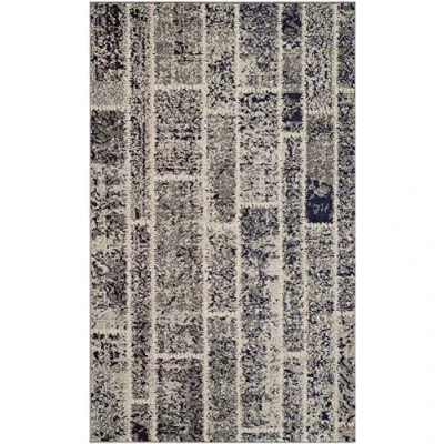Abbildung von SAFAVIEH Boho Teppich für Wohnzimmer, Esszimmer, Schlafzimmer Monaco Collection, Kurzer Flor, Grau und Multi, 91 X 152 cm