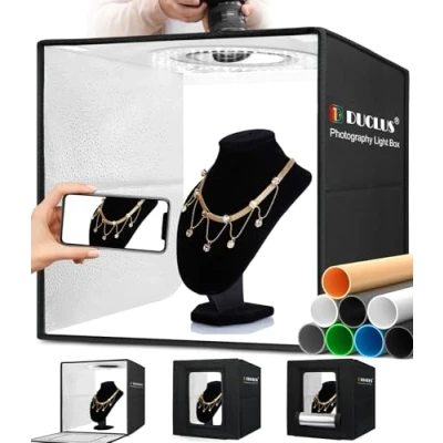 Abbildung von DUCLUS Fotobox 40x40 cm Faltbare Fotostudio, 5500K Dimmbare Lichtzelt Set mit 160 LED Beleuchtung und 8 Produktfotografie Hintergründe