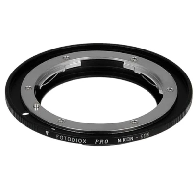 Abbildung von Fotodiox Pro Lens Mount Adapter Compatible with Nikon Nikkor F D/SLR on Canon EOS (EF, EF S) Camera Body Gen10 Focus Confirmation Chip