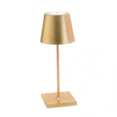 Abbildung von Zafferano Poldina Pro Mini Dimmbare LED Tischlampe aus Aluminium, Schutzart IP54, Verwendung im Innen /Außenbereich, Kontaktladestation, H30cm, EU Stecker (Blattgold)