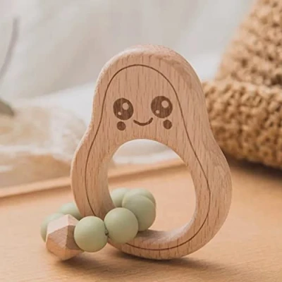 Abbildung von Avocado Beißring für Baby Natur Holz mint grün Kauspielzeug &amp; Zahnungshilfe Jungen Mädchen Babyspielzeug Beissring Greifring Geschenk zur Geburt Holzspielzeug BPA frei schadstofffrei