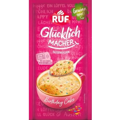 Abbildung von RUF Glücklichmacher Tassenkuchen Birthday Cake, aromatisch süßer Kuchen mit bunten Konfettis, in 90 Sekunden fertig, einfach Milch anrühren, 1 Portion