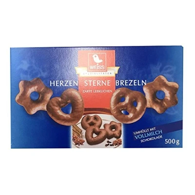 Abbildung von Weiss Herzen Sterne Brezeln Vollmilch