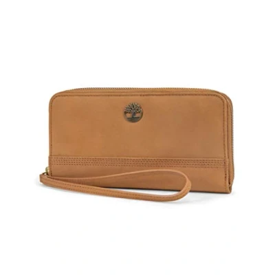 Abbildung von Timberland Damen Leder RFID Zip Around Wallet Clutch mit Handschlaufe, Wheat (Nubuck), Einheitsgröße