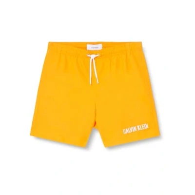 Abbildung von Calvin Klein Jeans Jungen Badeshorts Medium Drawstring Print Mittellang, Orange (Ip Water Reactive AOP), 10 12 Jahre