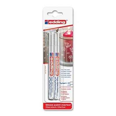 Abbildung von edding 751 Glanzlackmarker weiß Packung mit 2 Lackmarker Rundspitze 1 mm Lackstift für Glas, Stein, Holz, Kunststoff und Papier wasserfest, stark deckend